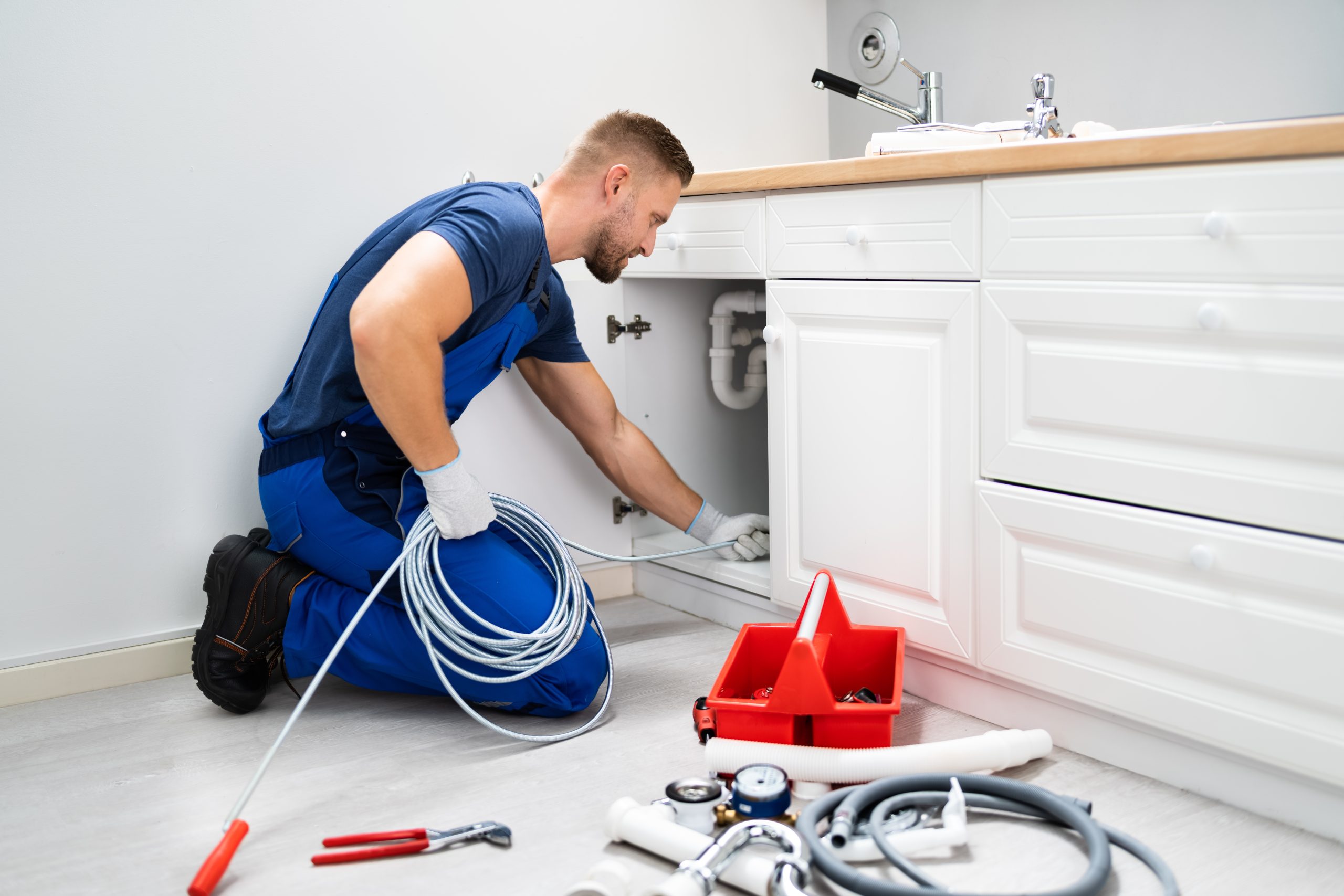 plumber cleaning drain plumber cleaning drain